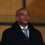 Patrice Motsepe looks on during the AFCON Group C match between Tunisia and Nigeria at Fes stadium, Fes, Morocco on December 27, 2025.