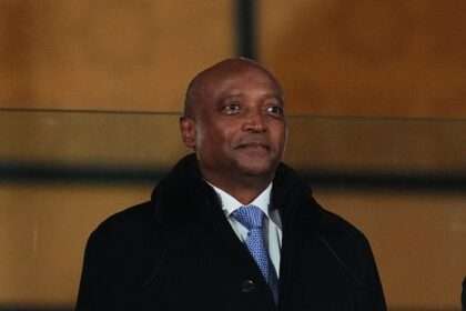 Patrice Motsepe looks on during the AFCON Group C match between Tunisia and Nigeria at Fes stadium, Fes, Morocco on December 27, 2025.