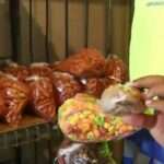 Packaged snacks displayed during a food safety inspection following a suspected food poisoning incident in the Eastern Cape.
