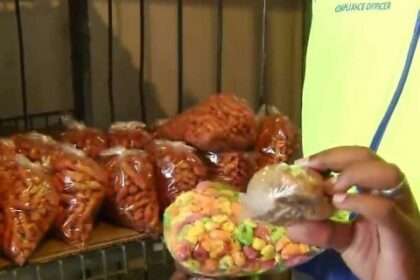 Packaged snacks displayed during a food safety inspection following a suspected food poisoning incident in the Eastern Cape.