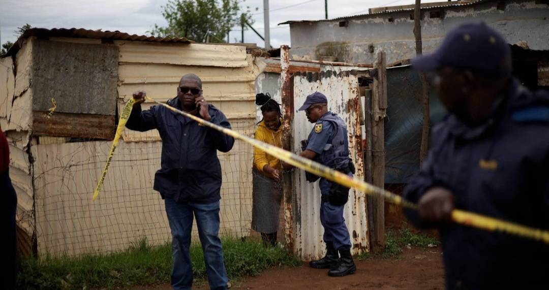 Police vehicle at a crime scene in South Afri